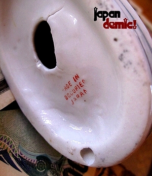 occupied-japan-base-red300 Made in Occupied Japan ceramic figurine red base.